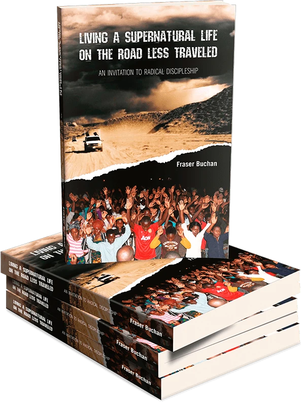 A three-dimensional book presentation of Living a Supernatural Life on the Road Less Traveled